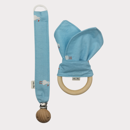 Set bijtring en speenkoord blauw met meeuwen